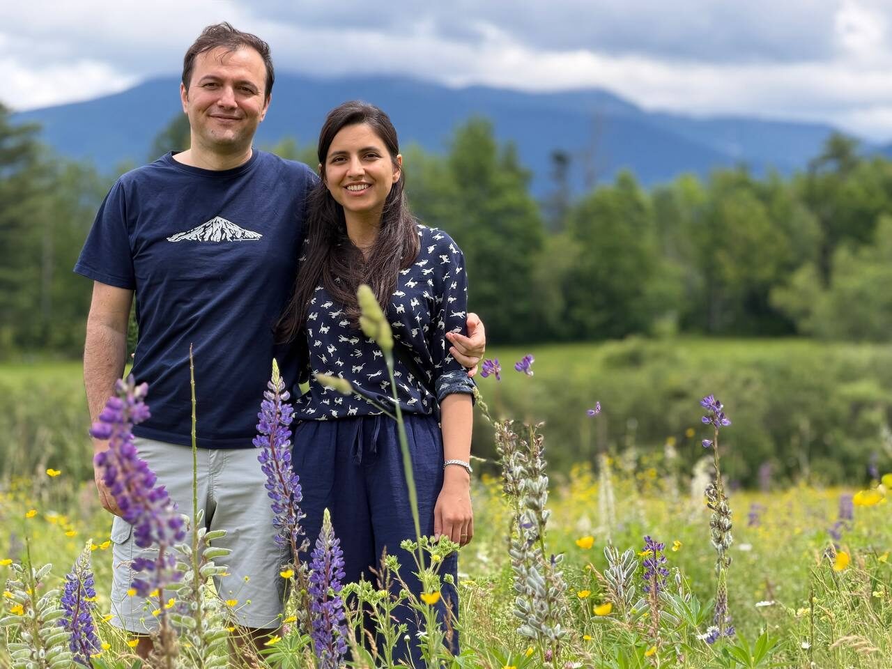 Amir and Bahareh in a lupine field at Sugar Hill, New Hampshire